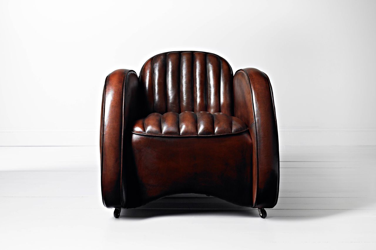 Mustang authentic leather chair echoing mid century automotive seat design
