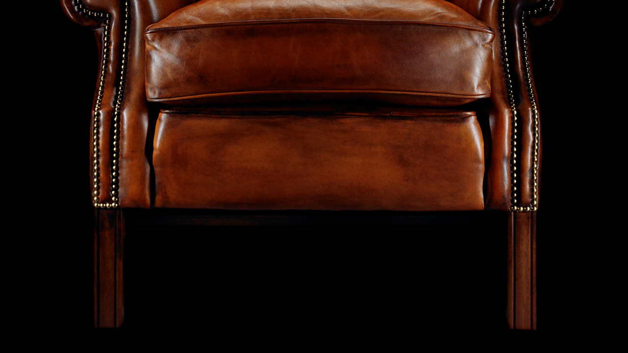 henry Throreau Leather Wing Chair