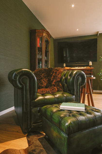 Hamilton
  leather Chesterfield chair in green