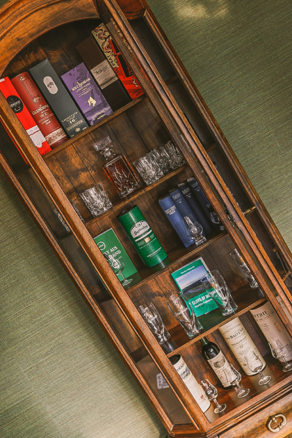 Mrs.
  Schutz wooden drinks cabinet
