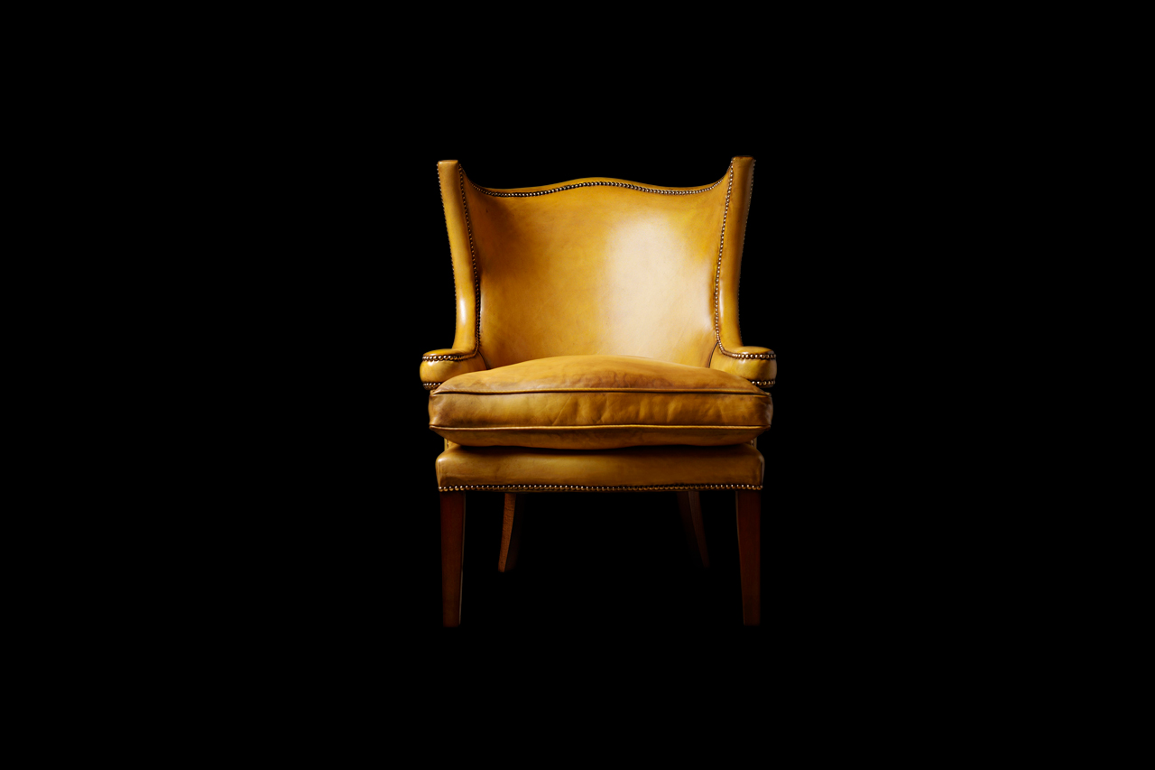 Jonathan Swift full grain leather chair highlighting artistic silhouette and utility