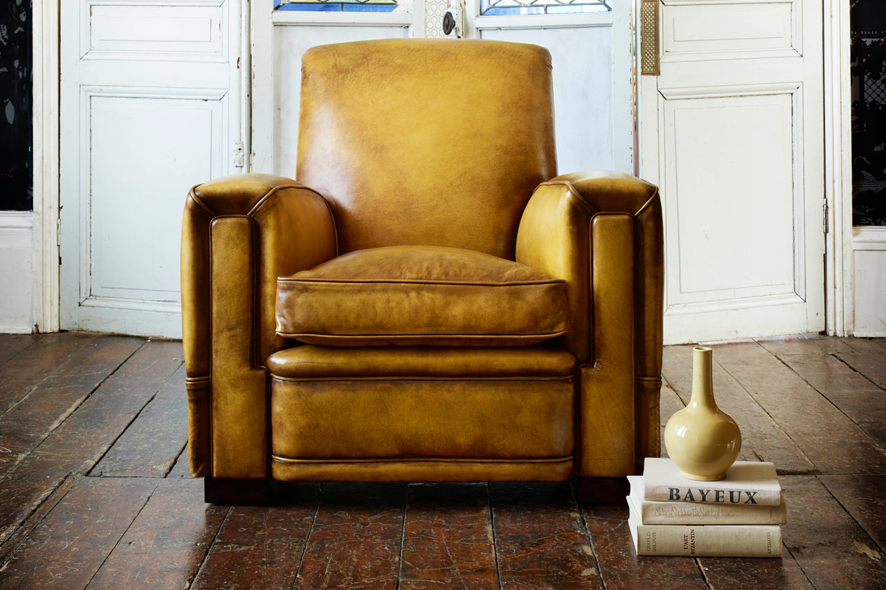 Chop real leather chair embodying comfort centric art deco style