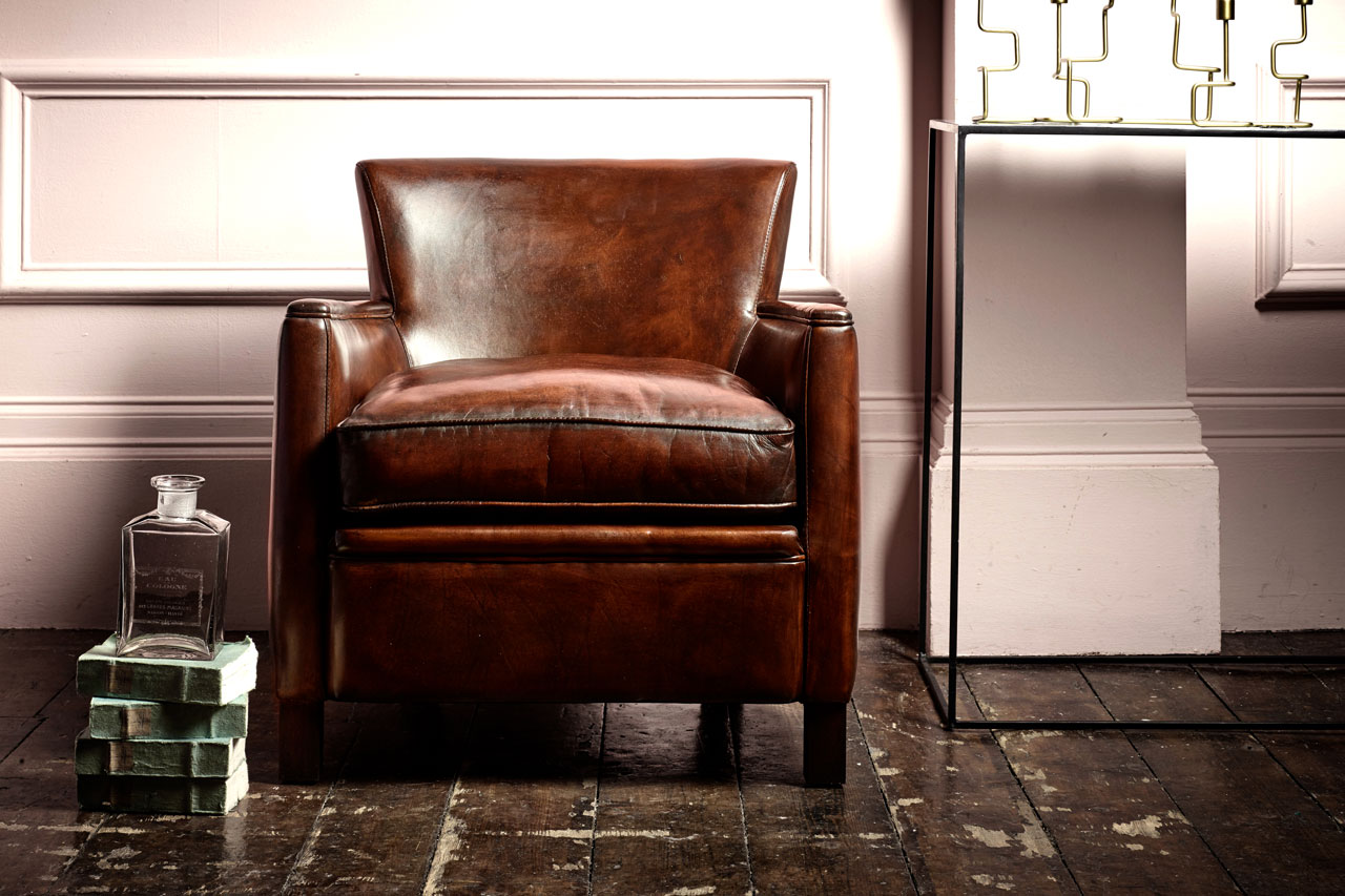 Kettle art deco leather chair with geometric features reflecting modernist design