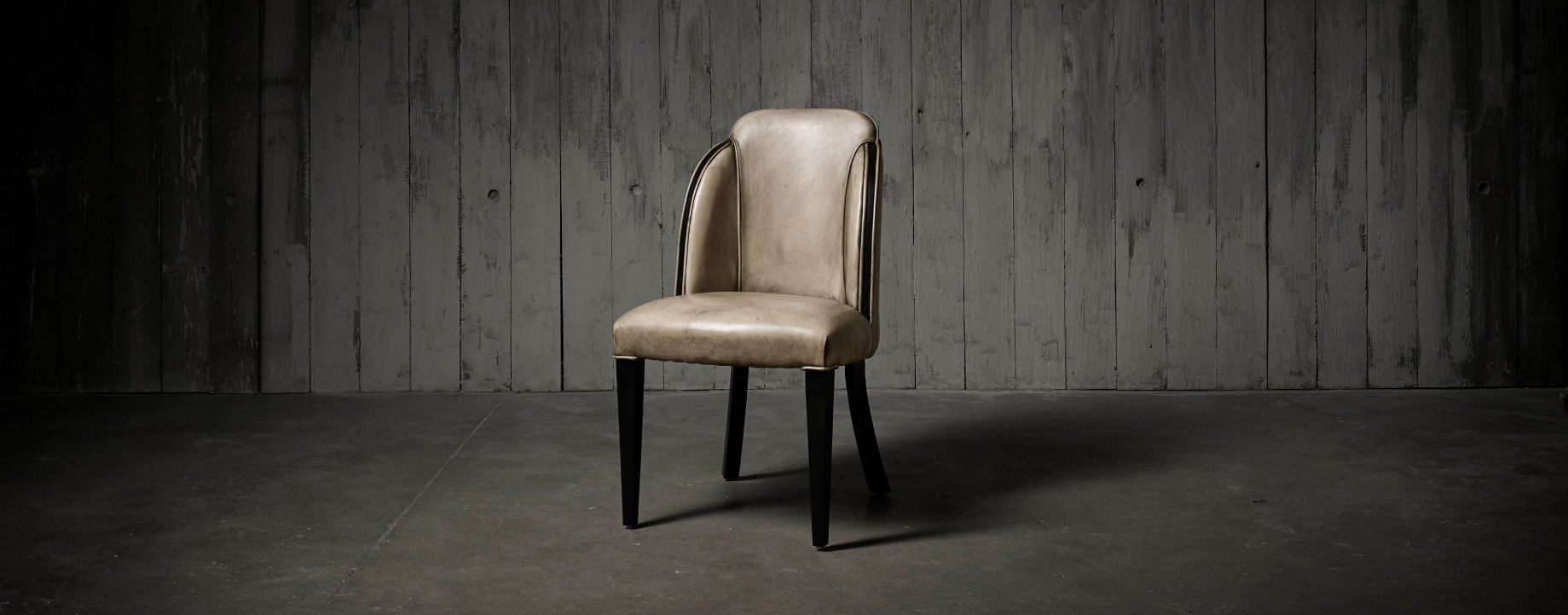Deco Diner dining chair with geometric curves and wraparound detailing