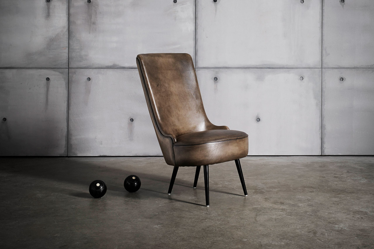 Blower chair achieving balanced graceful aesthetics
