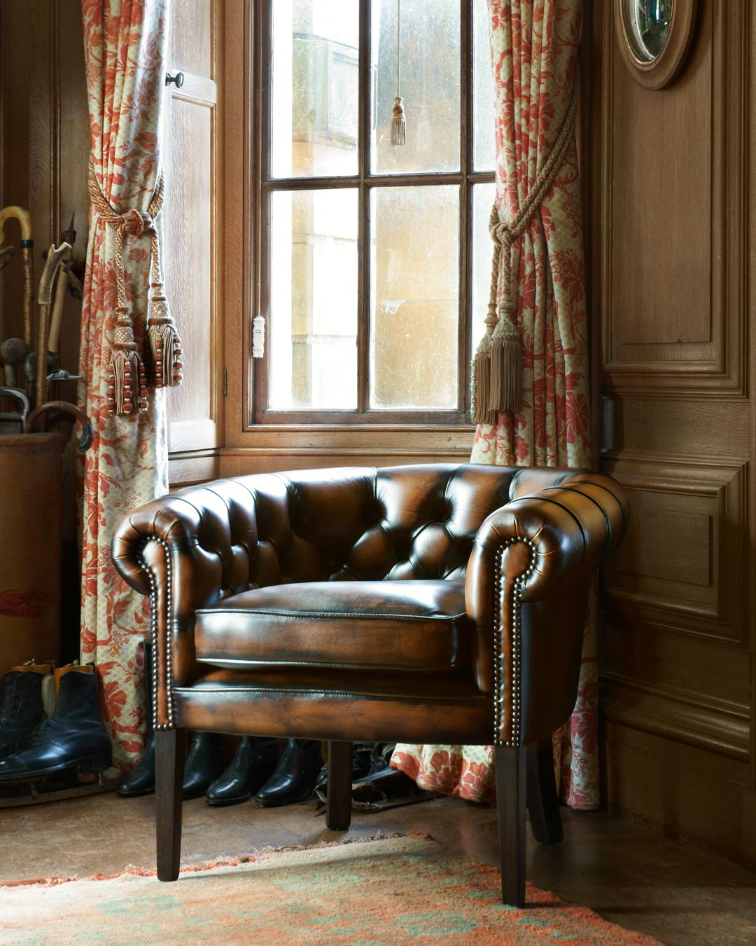 Victoria compact chesterfield chair with refined linear silhouette