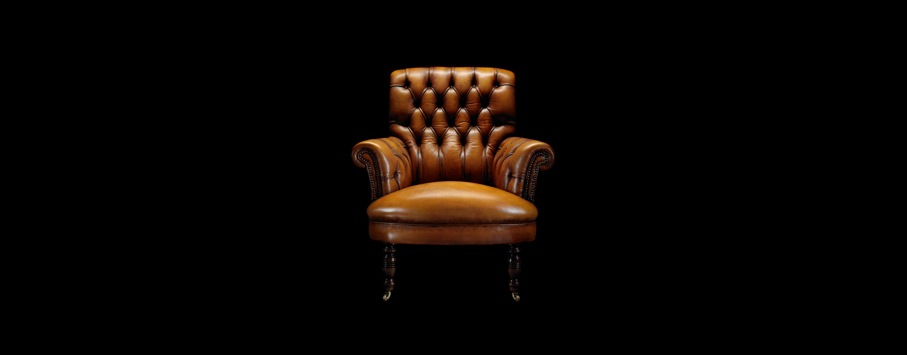 David Hume tufted chesterfield chair showcasing refined craftsmanship