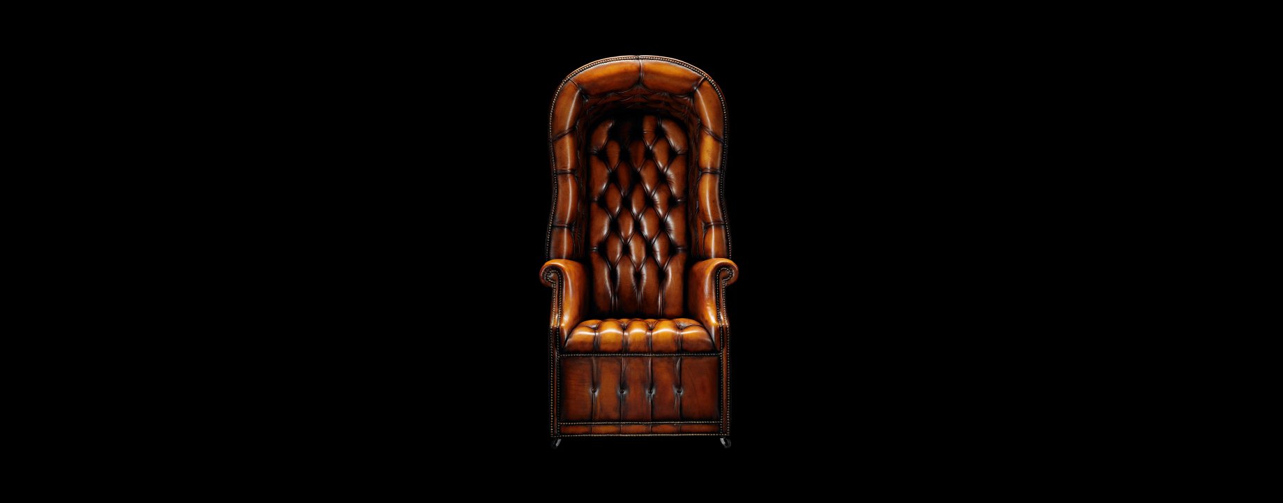 Porters statement chesterfield chair with distinctive sculptural presence