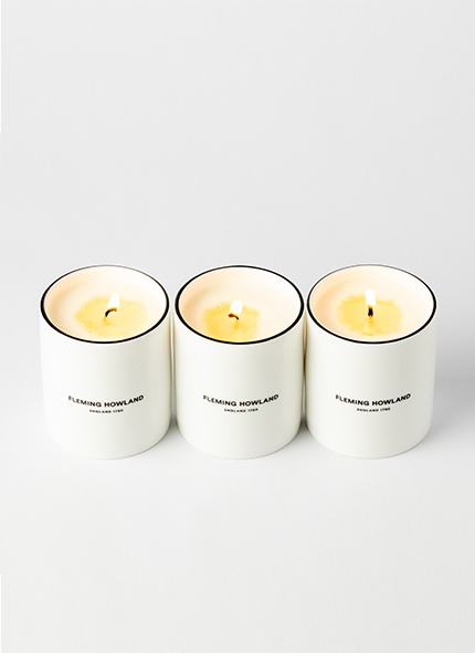 Three candles illuminating