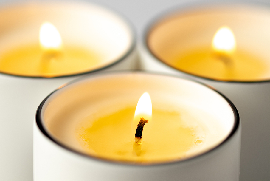 Multiple candles illuminating